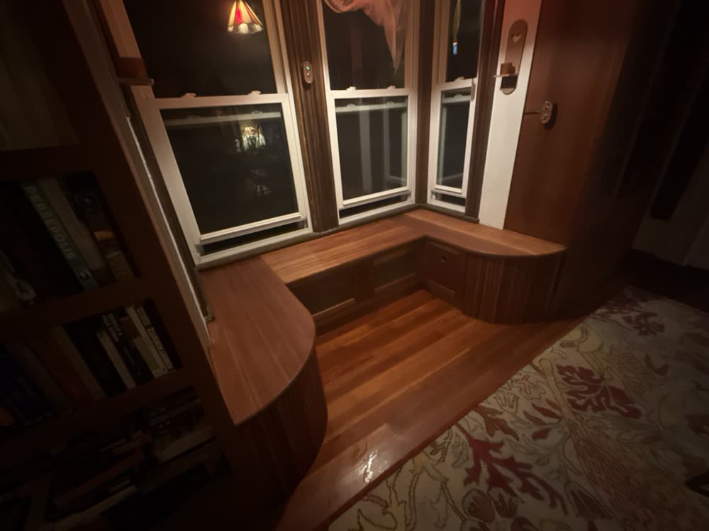 Window seat in warm wood