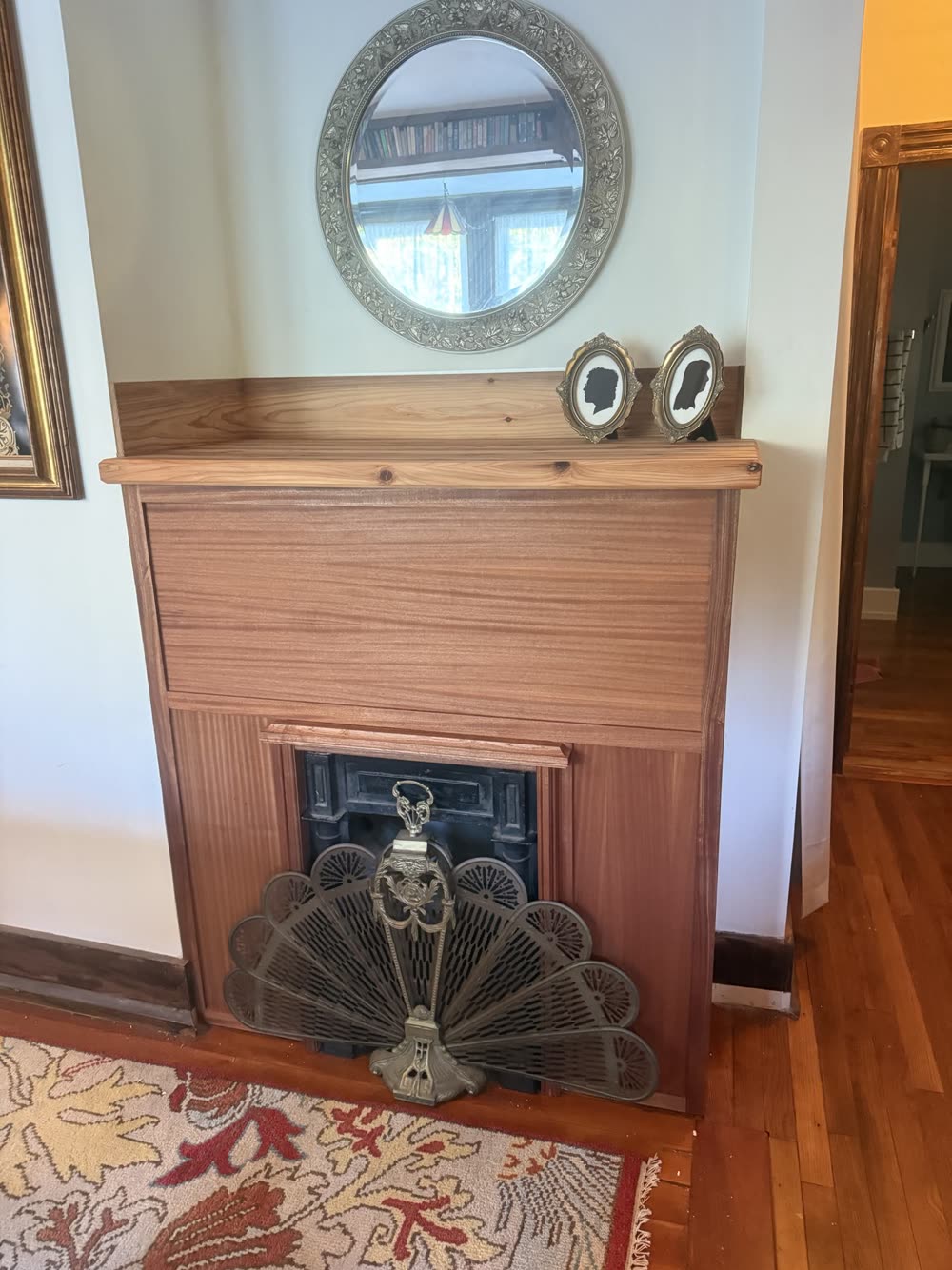 Wood fireplace surround and mantel