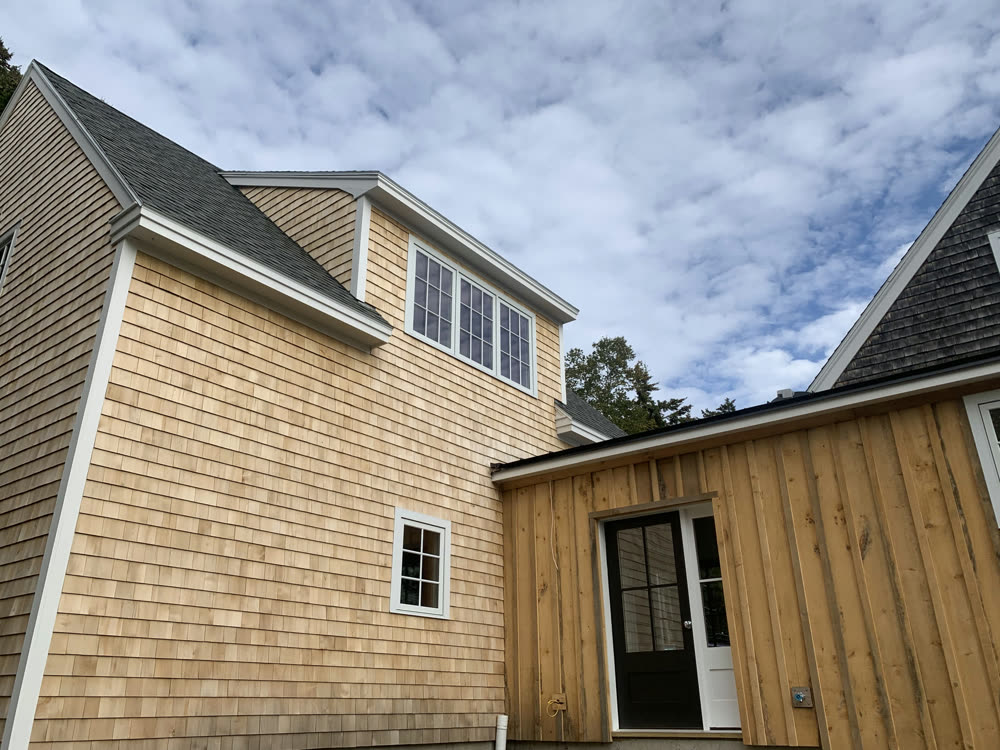 Addition with board-and-batten entry